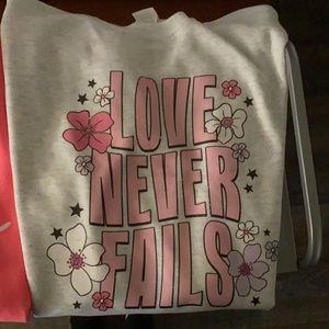 Love never fails gray crewneck